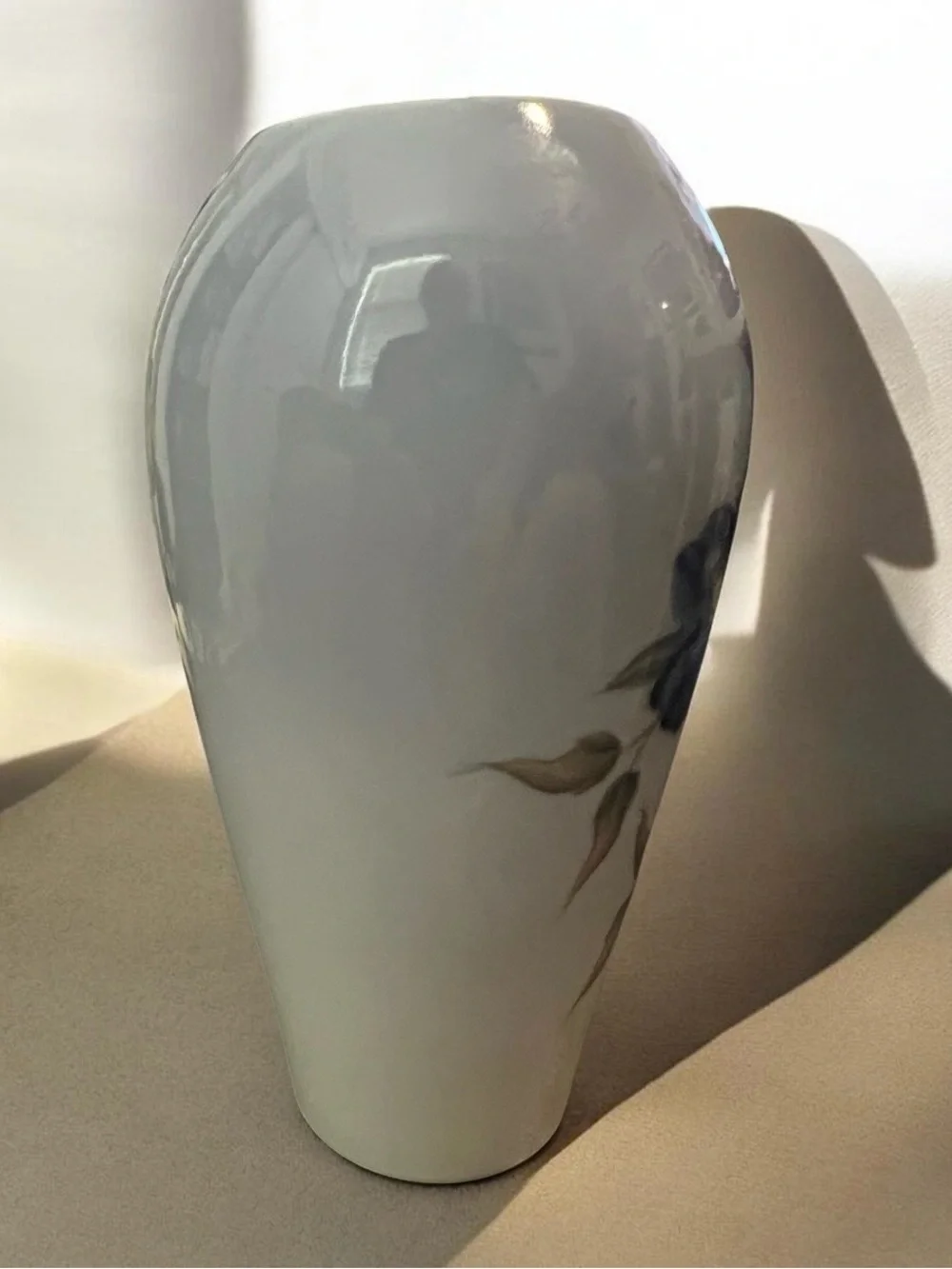 MCM Royal Copenhagen porcelain vase with hand-painted floral motifs.